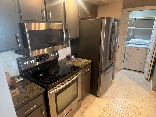 Building Photo - Updated Condo with Water view - Available ...