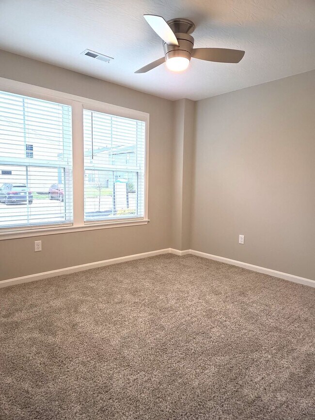 Building Photo - Exquisite just built condo with everything! Ground floor, no stairs, attached garage