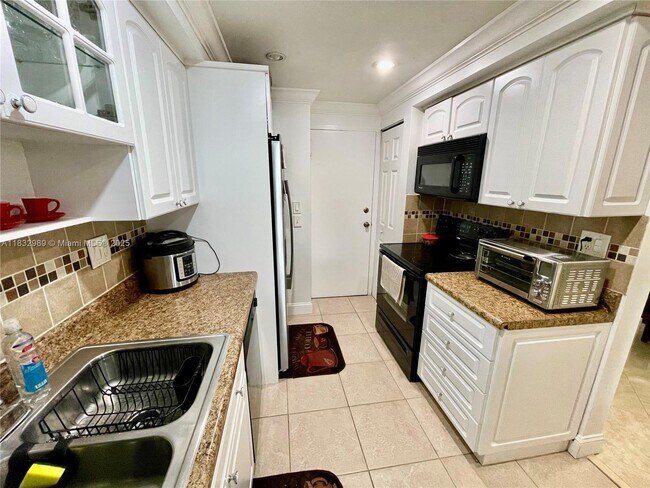 Building Photo - 6861 SW 147th Ave