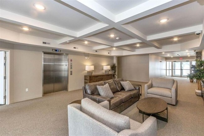 Building Photo - LUXURY CONDO - AVAILABLE NOW - MOVE IN PROMO
