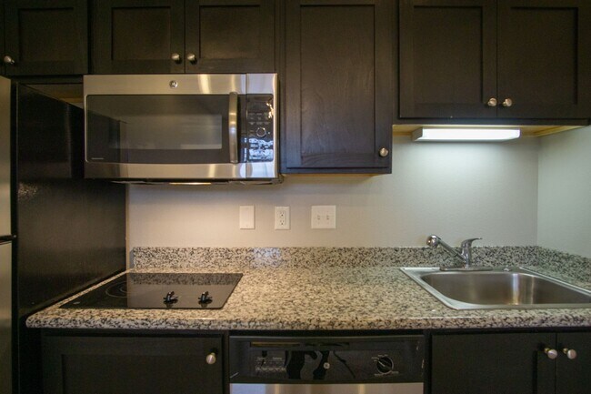 Building Photo - Contemporary Townhouse w Electric Fireplace, DW, & Juliette Balcony!