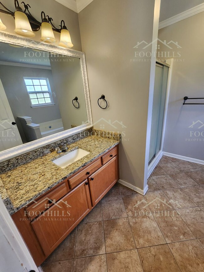 Building Photo - Beautiful 3-Bedroom Brick Home with Sunroo...