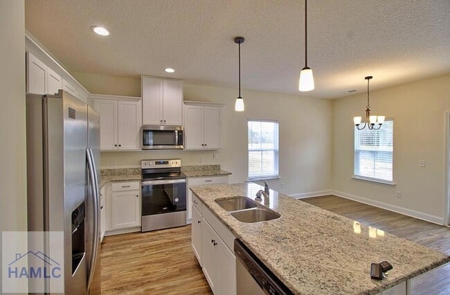 Building Photo - 805 Meloney Dr