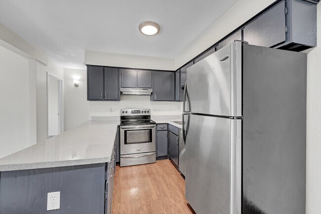 Building Photo - $940.95 with Half Off the first month's rent, 1 Bed, 1 Bath, Condo in Denver with Cozy Fireplace!
