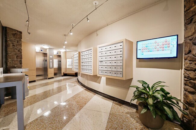 Building Photo - Spacious, and Sunlit 1 BD/1 BA Condo w/Reserved Garage Parking and Utilities Included in Chevy Ch...