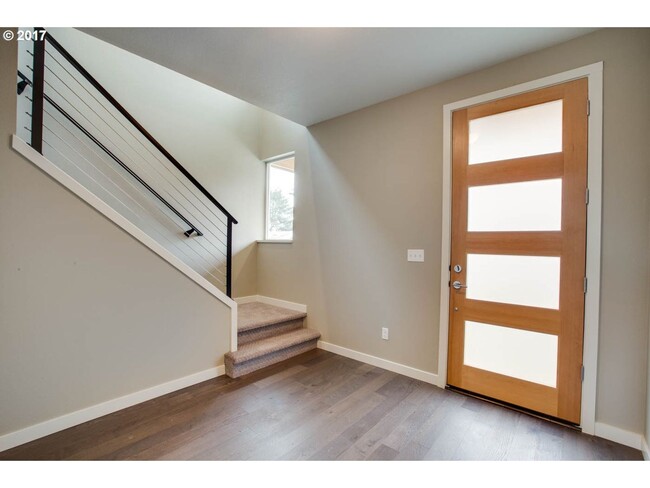 Building Photo - Charming 3BR Home with Fireplace, Bright Open Living Spaces & Loft