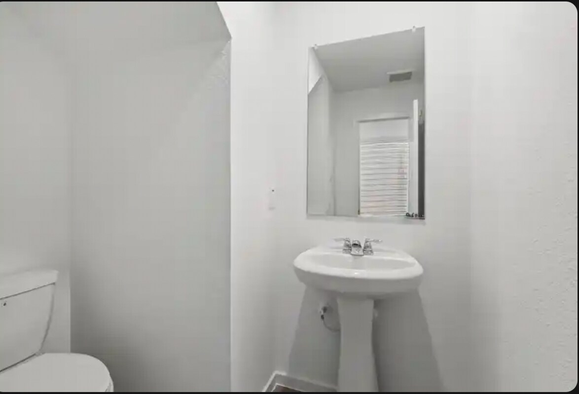 1.5 bath on entrance - 726 Sandhill Crane Ln