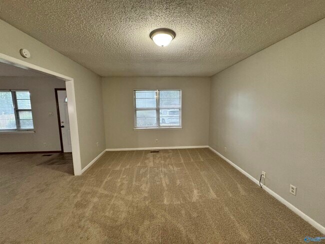 Building Photo - 3812 Melody Cir NE