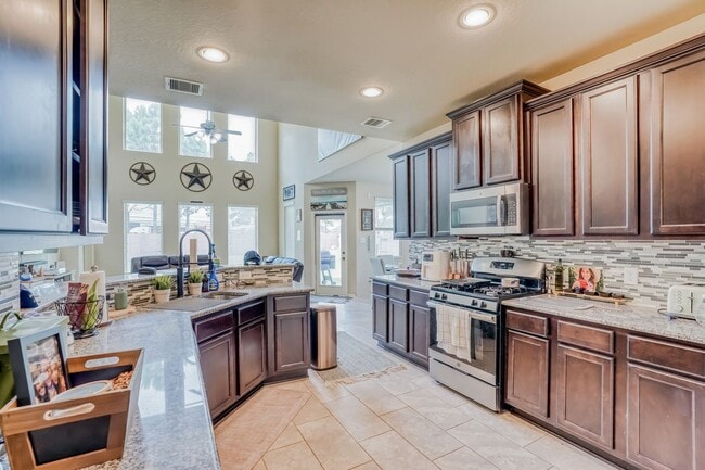 Building Photo - 4 BR/3.5BA | Newly Renovated Single Family Home | Fenced backyard | Study & Game Room | In Grand ...