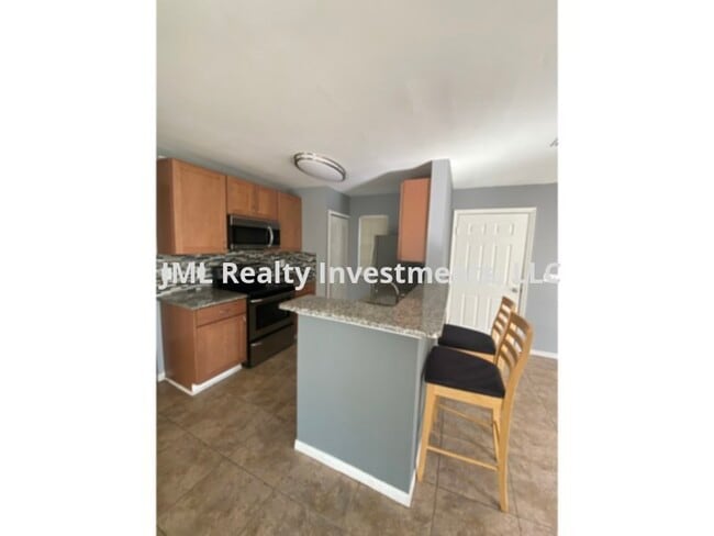 Building Photo - 2 bedroom 2 bath 1st floor condo in the Hidden Village Condos of Lake Mary