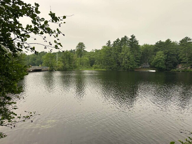 Building Photo - Charming 3BR Waterfront Retreat with Sunroom, Brick Accent & Scenic Lake Views