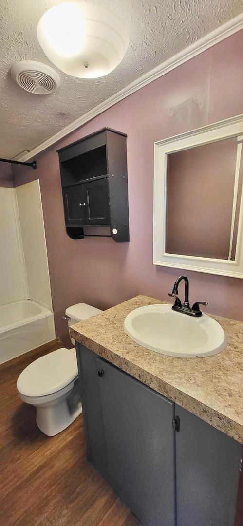 Building Photo - 2/1 single wide outside city limits