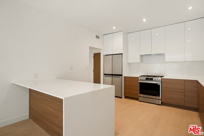 Building Photo - 10630 Wilkins Ave