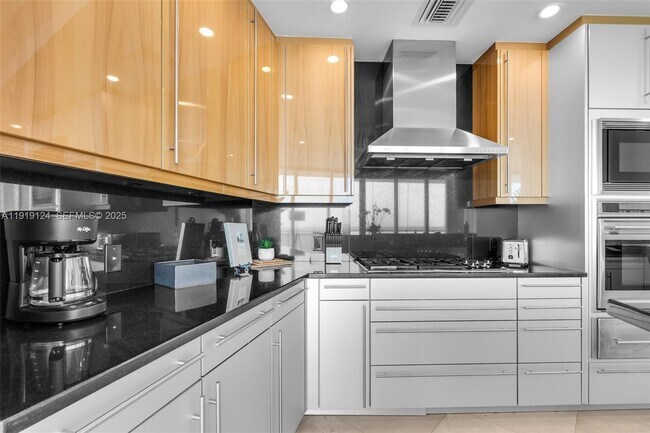 Building Photo - 10295 Collins Ave