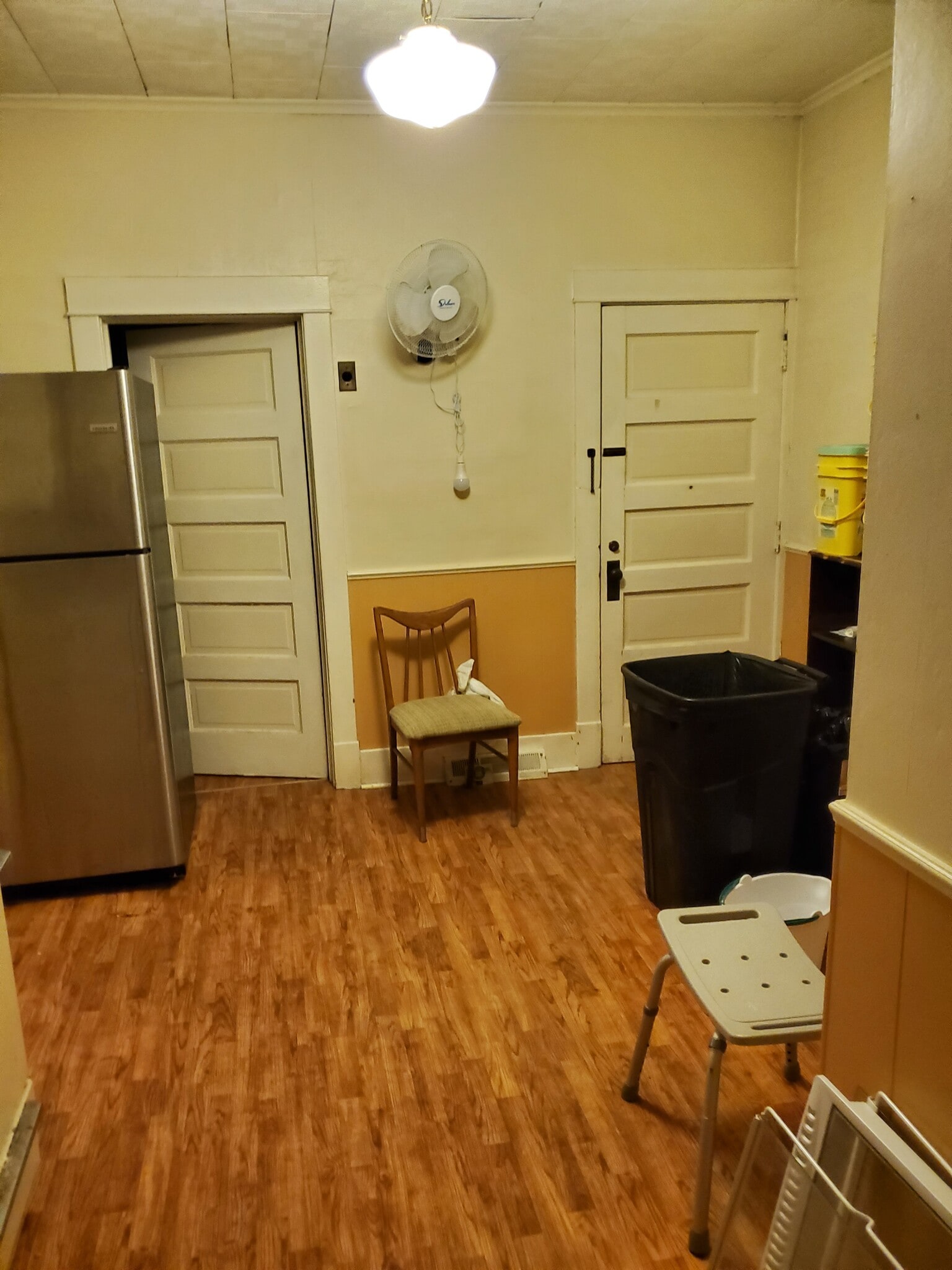 fridge, bathroom door, back entrance - 606 7th St N
