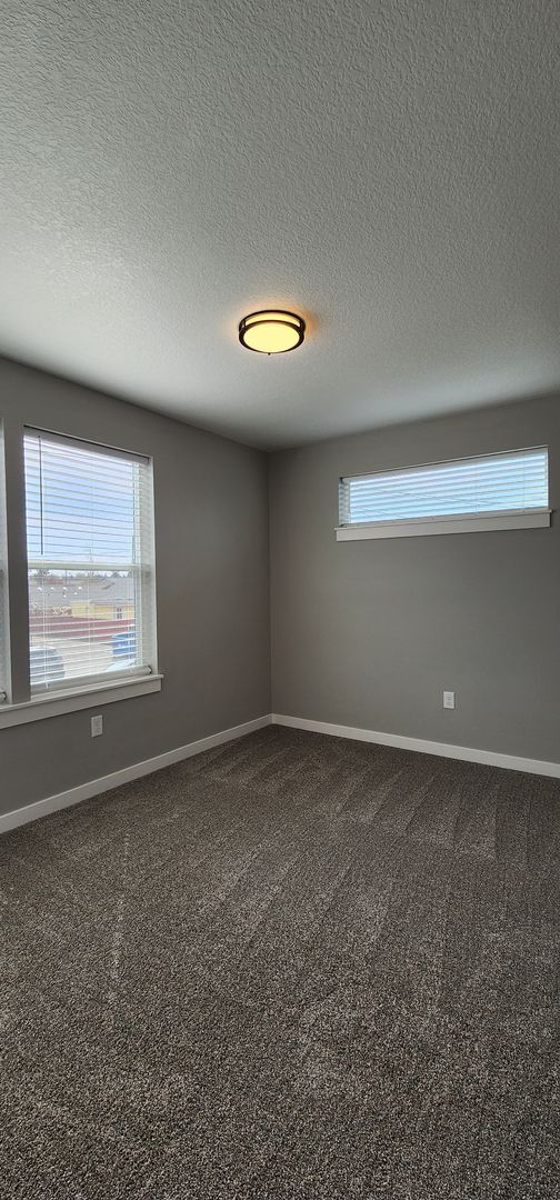 Building Photo - MOVE IN SPECIAL! New Construction Duplex i...