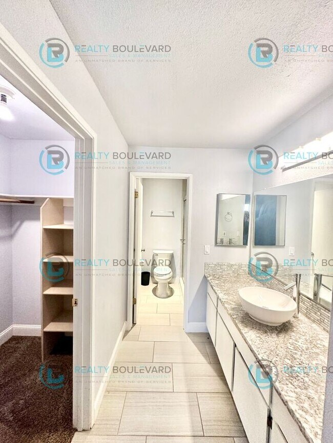 Building Photo - Indulge in comfortable living at Wood Chase Condos!