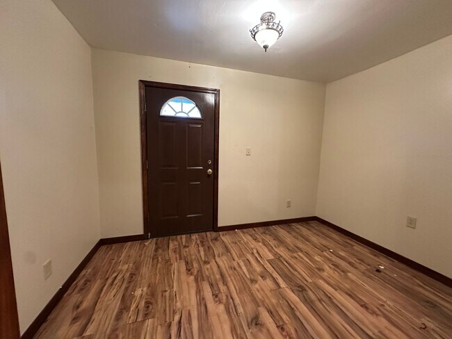 Building Photo - Available July 1st***Welcome to this charming 4-bedroom, 2-bathroom home located in the heart of ...