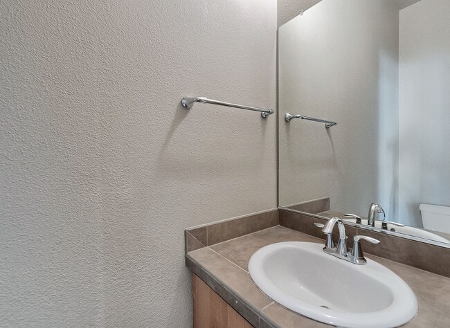 Building Photo - 2BR + 2.1BA Corner Townhome-Style Condo — Dual Primary Suites, Attached Garage & Most Utilities I...