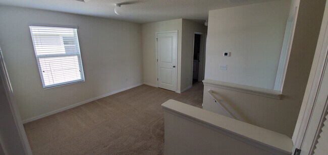 Loft space, linen closet - 7583 Tuscan Bay Cir