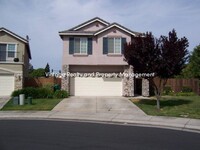 Building Photo - Available Now!! Big 4 Bedroom Home In A Ga...