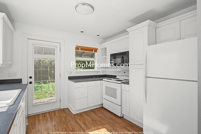 Building Photo - 9038 NE Humboldt St