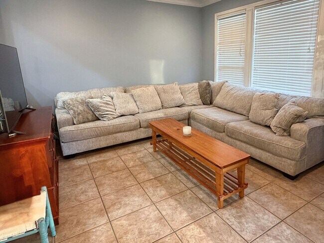 Building Photo - 3/2 with grass cutting included & access to community amenities.