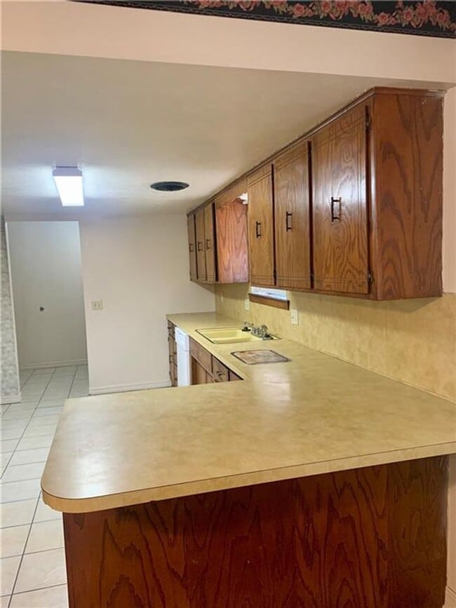 Building Photo - Charming Home with Open Kitchen, Fireplace & 2-Car Garage