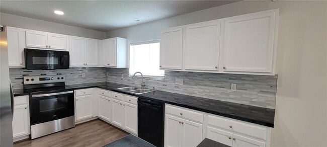 Building Photo - 9543 Maxson Dr