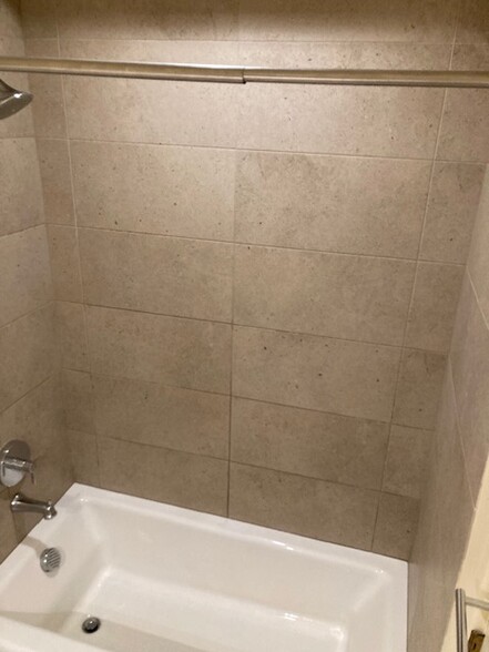 Stone tile in bathroom - 2202 SW Kings Ct