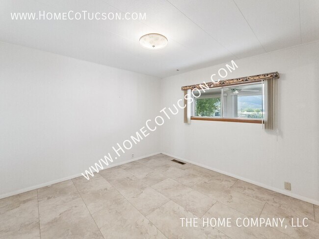 Building Photo - 10675 N Kilimanjaro Ave