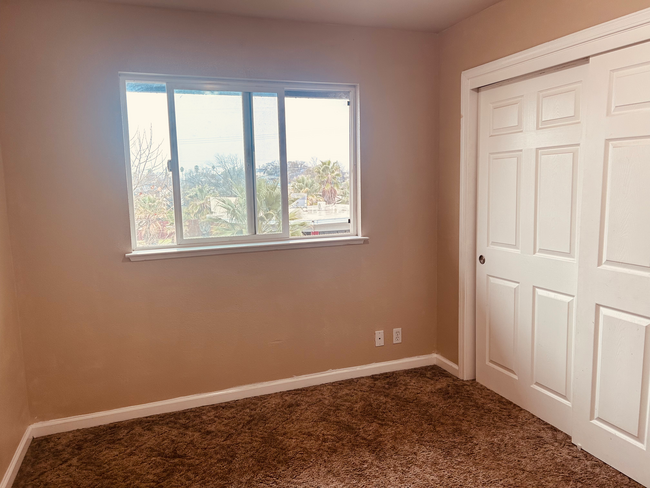 Bedroom closet and window - 3460 Orange Ave