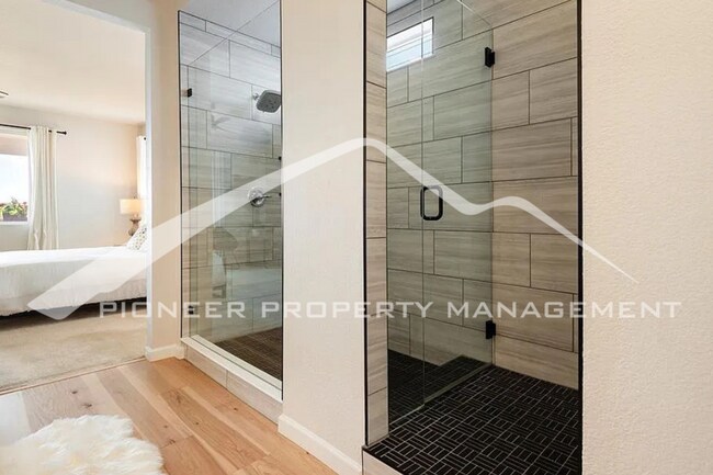 Building Photo - Stylish Main-Level Living with Finished Ba...