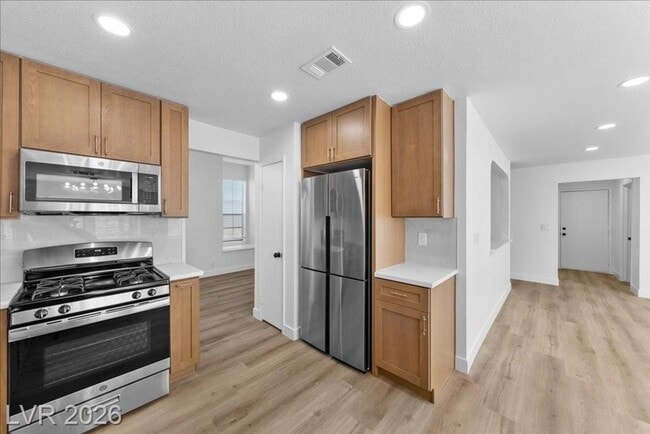 Building Photo - Modern 3Bed/2.5Bath/2Car - 2 Story Home Located In The Guard-Gated Los Prados Golf Community!