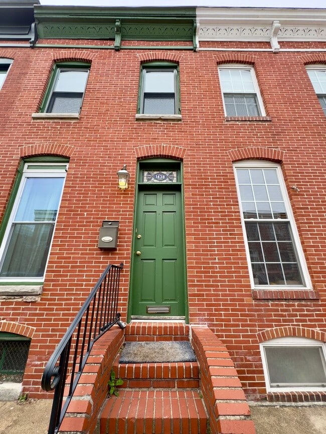 Building Photo - Charming 2 Bedroom/1 Bathroom Townhome with Deck and Parking Pad in South Baltimore!