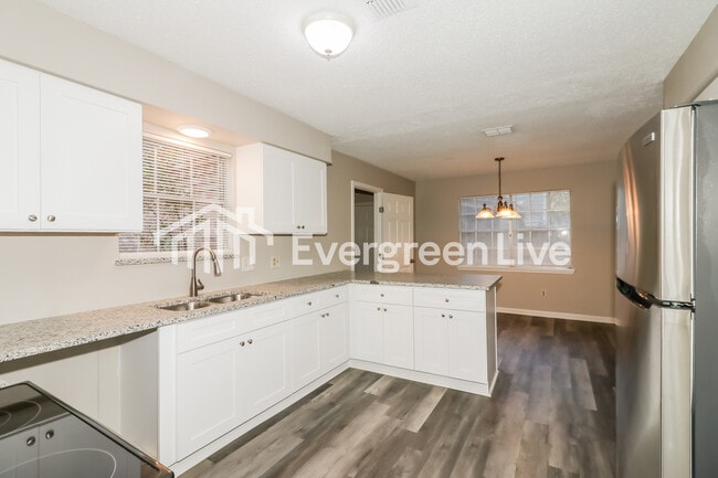 Building Photo - 5506 Pine Arbor Dr