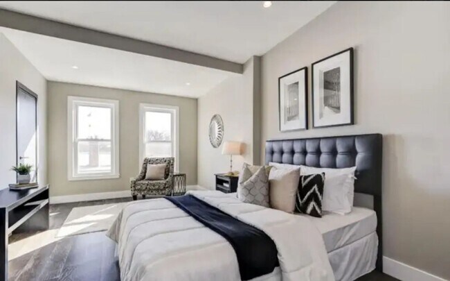 Building Photo - “Elegant 3-Story Home Showcasing High-End Renovation, Gourmet Kitchen, and Private Deck for Moder...