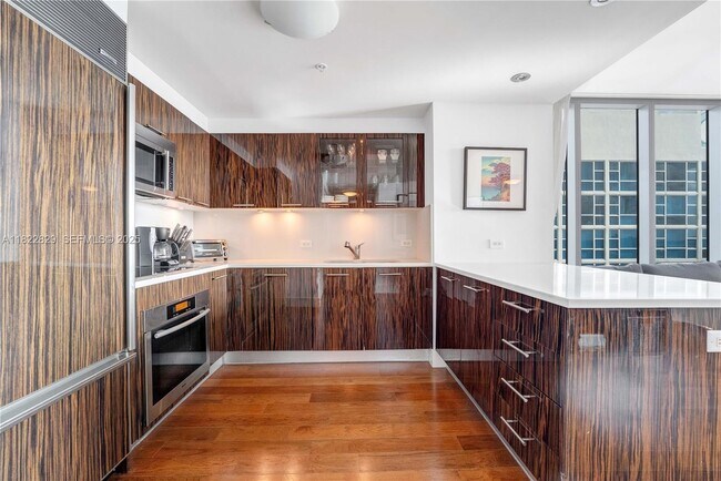 Building Photo - 6899 Collins Ave