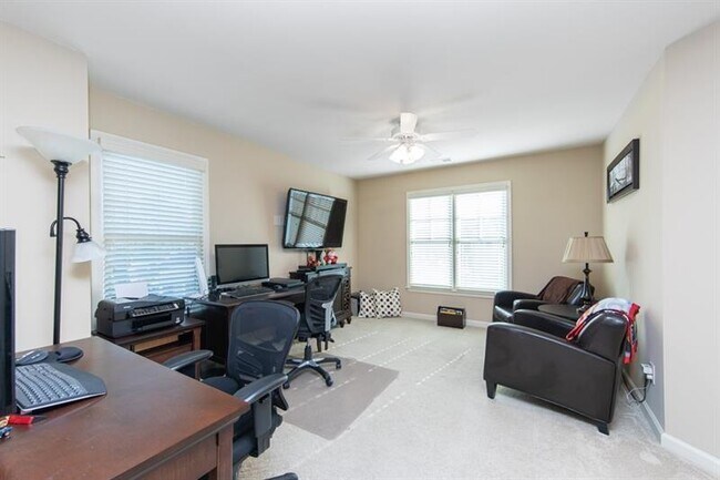 Building Photo - 8580 Village School Dr