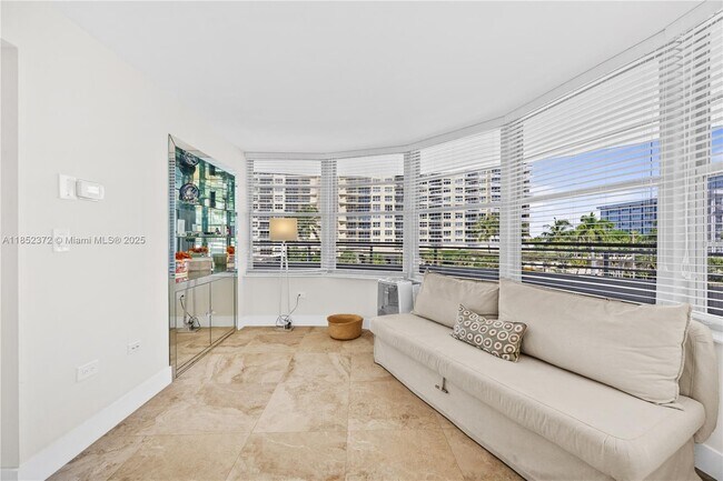 Building Photo - 5555 Collins Ave