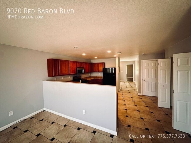Building Photo - 9070 Red Baron Blvd