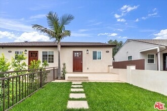 Building Photo - 6917 Encino Ave