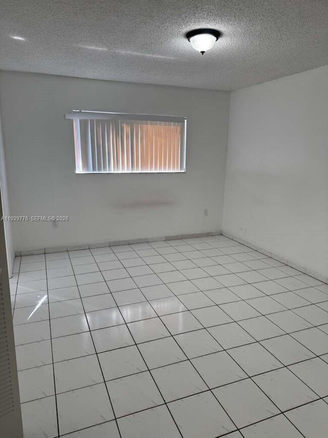 Building Photo - 5480 W 21st Ct