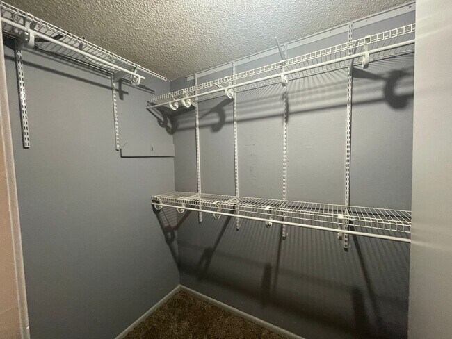 Building Photo - This spacious 3-bedroom, 2-bathroom apartment