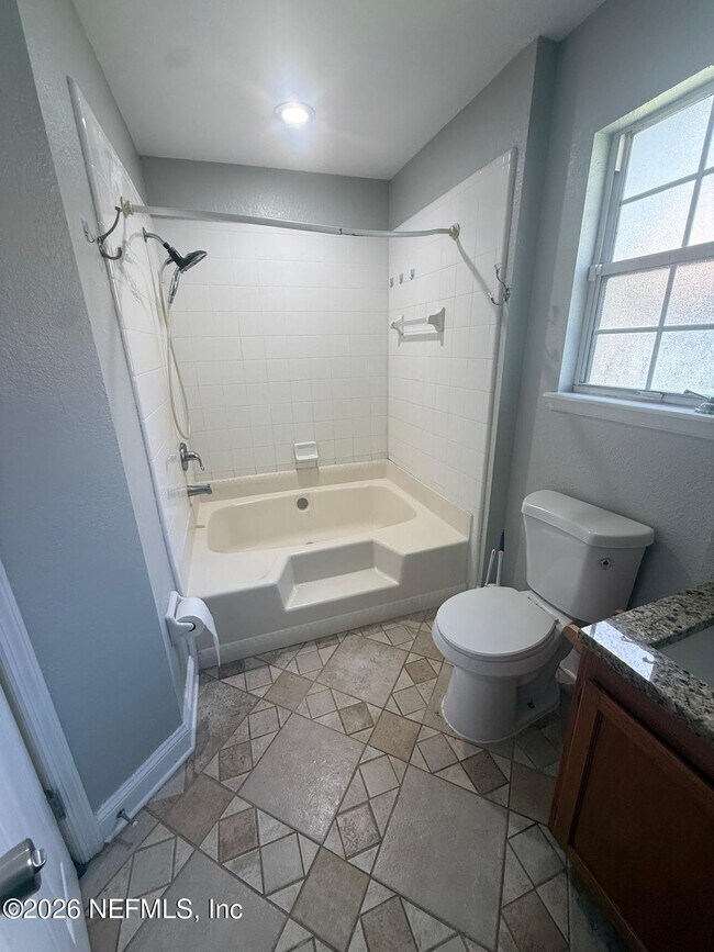 Building Photo - 7945 Macinnes Dr