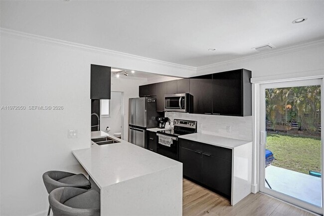 Building Photo - 3320 NE 13th Ave