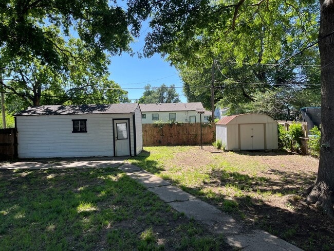 Building Photo - Step into this beautifully updated 1950's gem, where charm meets modern convenience