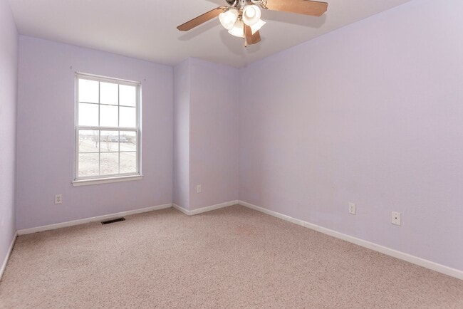 Building Photo - Spacious Duplex with Fenced Yard