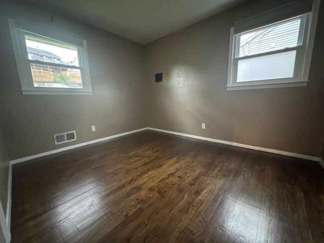 Building Photo - Sunny, Modern Mid-Century Cape 4 BR Spacio...
