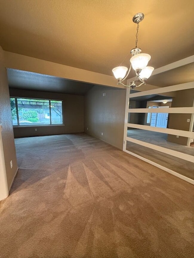 Building Photo - OPEN HOUSE this Wednesday 5pm-6:30pm - Private Redwood Setting | 4BR Home with Family Room, Bar &...